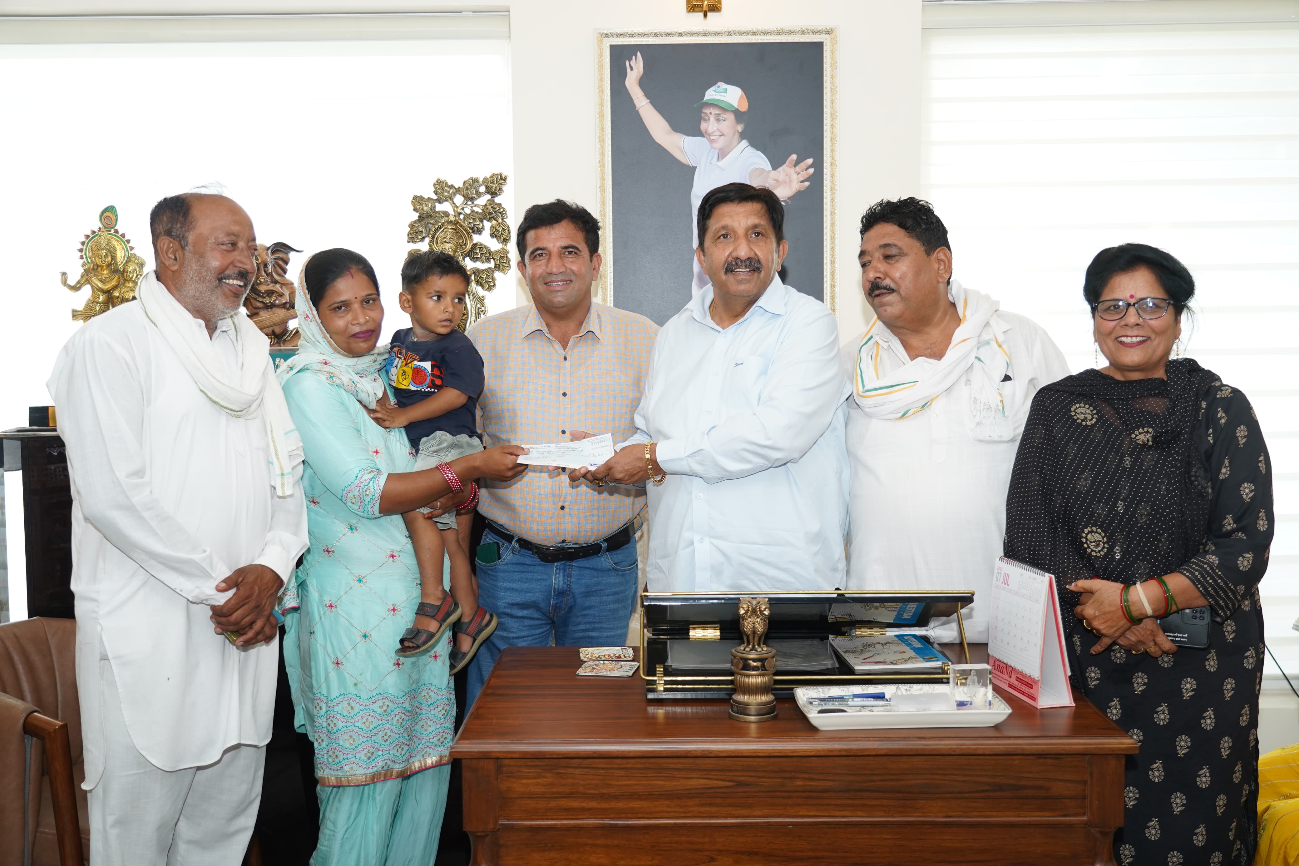 Deputy Chief Minister distributed cheques to the needy